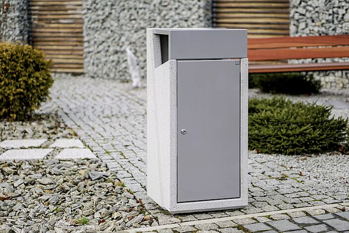 <div id="container" class="container">Abfallbehälter INTAL mit Ascher, Schutzdach und Tür in RAL 9007 graualuminium, Beton sandgestrahlt</div>
