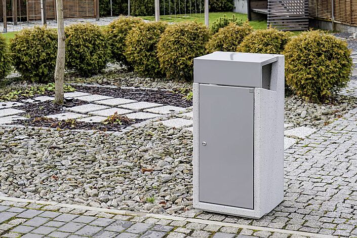 <div id="container" class="container"><div id="container" class="container">Abfallbehälter INTAL mit Ascher, Schutzdach und Tür in RAL 9007 graualuminium, Beton sandgestrahlt</div></div>