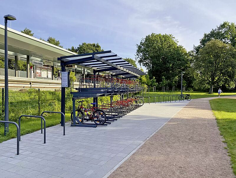 doppelstock-fahrradparksystem-flexhub__shoKAT0067590 Doppelstock-Fahrradparksystem FLEXHUB, Stahlkonstruktion in DB 703 eisenglimmer, Fahrradüberdachung TUCANA mit auftragsbezogener Anpassung, 2 Anlagen, Dachbreite x Dachtiefe 21600 mm x 2300 mm