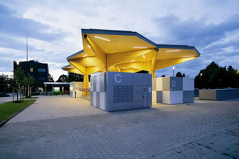 Fahrradgarage FULLERTON-E, 8 Anlagen mit jeweils 8 Boxen, doppelstöckig, Höhe x Breite x Tiefe 2885 mm x 3611 mm x 2100 mm, inklusive Zugangs- und Buchungssystem SmartBikeBox®, Stahlkonstruktion in RAL 9006 weißaluminium bzw. RAL 9003 signalweiß, Besch...