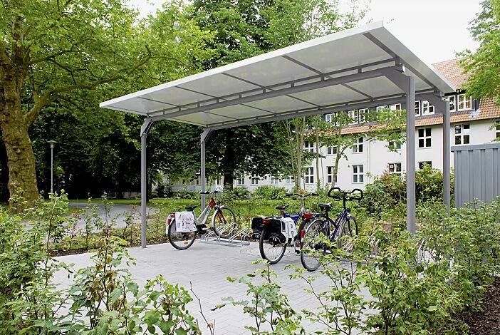 Fahrradüberdachung MATRIX Dachbreite x Dachtiefe 5090 mm x 2750 mm, einseitig, ohne Rück- und Seitenwände, Stahlkonstruktion in RAL 9007 graualuminium, Dachkassetten in RAL 9002 grauweiß<br /> <br /> Fahrradüberdachung MATRIX Dachbreite x Dachtiefe 5090 mm x 2750 mm, Stahlkonstruktion feuerverzinkt und pulverbeschichtet, Dacheindeckung Stahlblechkassetten