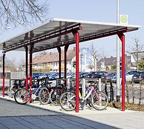 Fahrradüberdachung MATRIX, auftragsbezogene Anpassung, 2 Stück je Dachbreite x Dachtiefe 4490 mm x 2750 mm, Anlehnbügel LOTLIMIT, Stahlkonstruktion in RAL 3003 rubinrot