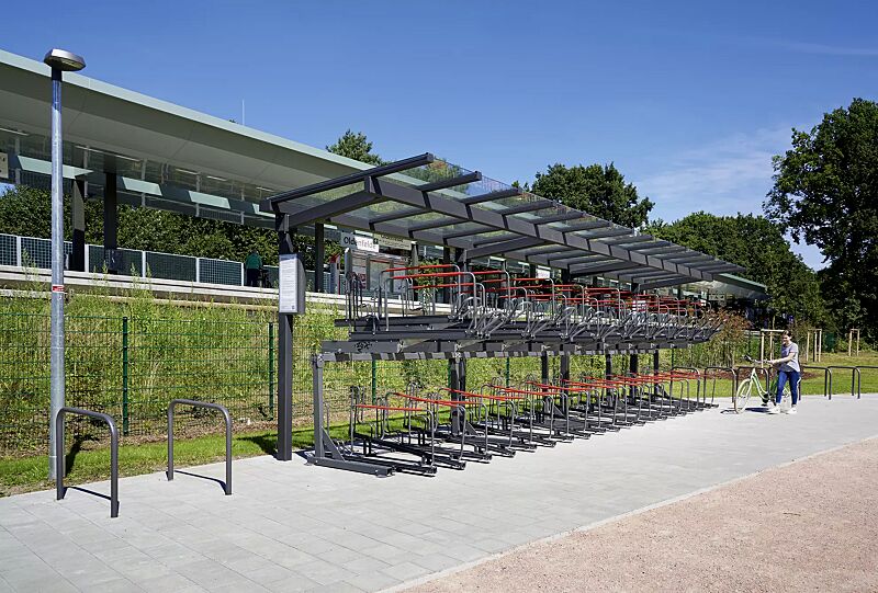fahrradueberdachung-tucana-fuer-doppelstock-fahrradparksysteme__shoKAT0064602 Fahrradüberdachung TUCANA für Doppelstock-Fahrradparksysteme, Dachbreite x Dachtiefe 10600 mm x 2300 mm (auftragsbezogene Anpassung), Doppelstock-Fahrradparksystem FLEXHUB, Stahlkonstruktion in DB 703 eisenglimmer