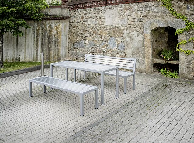 Tisch LIGURIA zum freien Aufstellen, mit Edelstahlauflage sowie Sitzbank LIGURIA, mit und ohne Rückenlehne sowie Ascher FINTWIN
