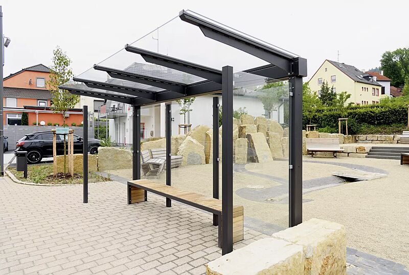 wartehalle-virgo__shoKAT0060438 Wartehalle VIRGO, einseitig, Dachbreite x Dachtiefe 4720 mm x 1800 mm, Rück- / Seitenwände ESG Klarglas, Sitzbank bauseitig, Stahlkonstruktion in DB 703 eisenglimmer